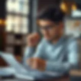 A thoughtful individual reviewing financial documents